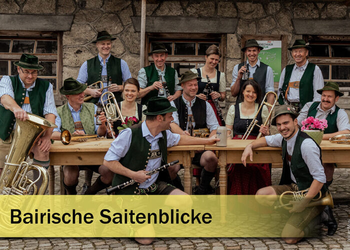 Slider-Künster-Bairische-Saitenblicke Gruppenbild der Waller Musi mit Instrumenten