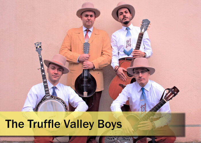 Slider-Künster-Truffle-Valley-Boys Die Truffle Valley Boys mit Instrumenten vor Wand